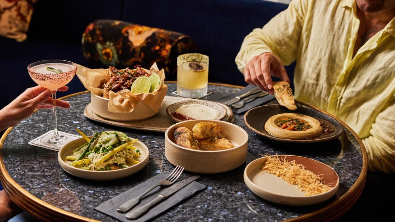 Ovolo The Valley Brisbane Bagian luar foto A selection of dishes at the restaurant